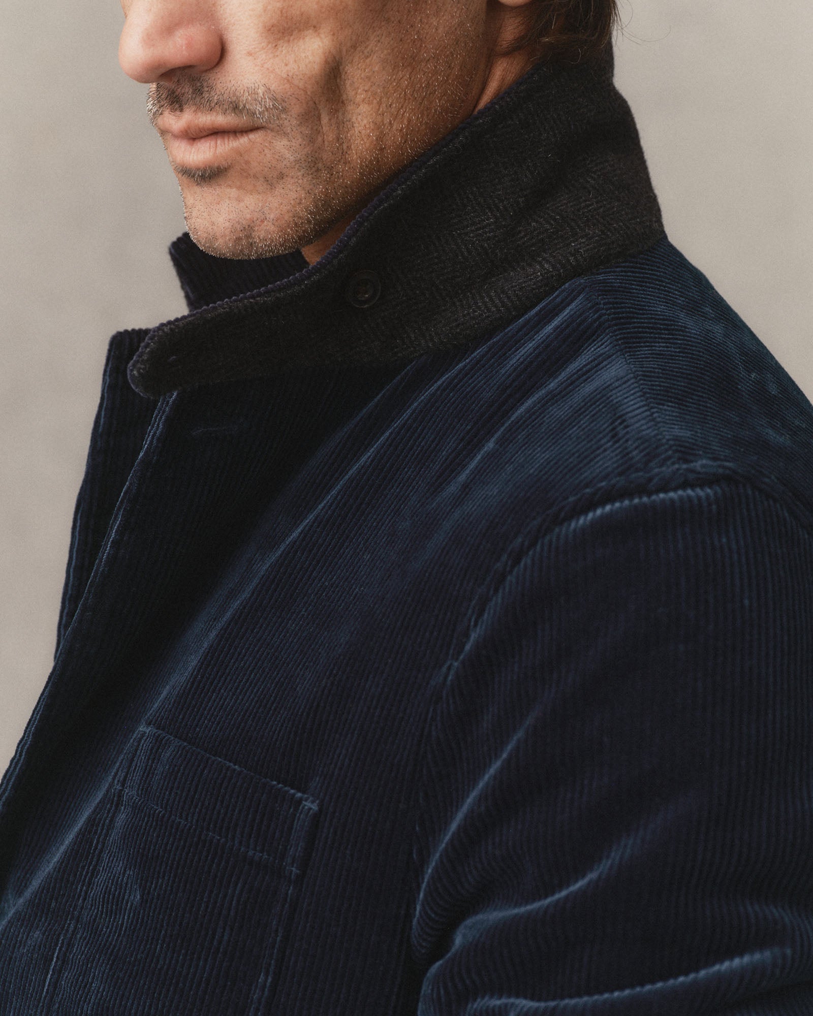 fit model showing off the collar on The Riley Sportcoat in Dark Navy Corduroy, Outerwear by Taylor Stitch