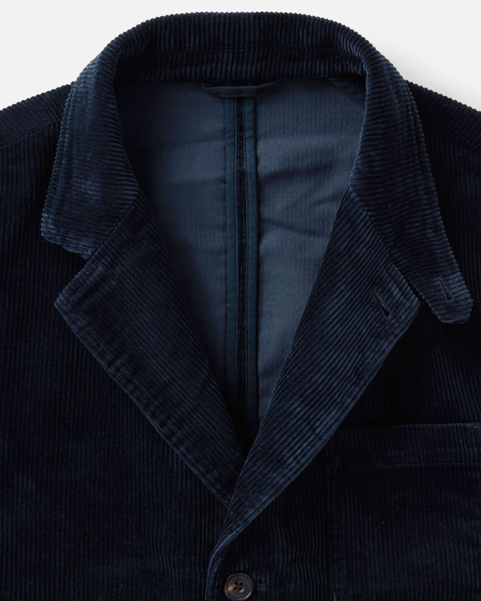 material shot of the collar on The Riley Sportcoat in Dark Navy Corduroy, Outerwear by Taylor Stitch