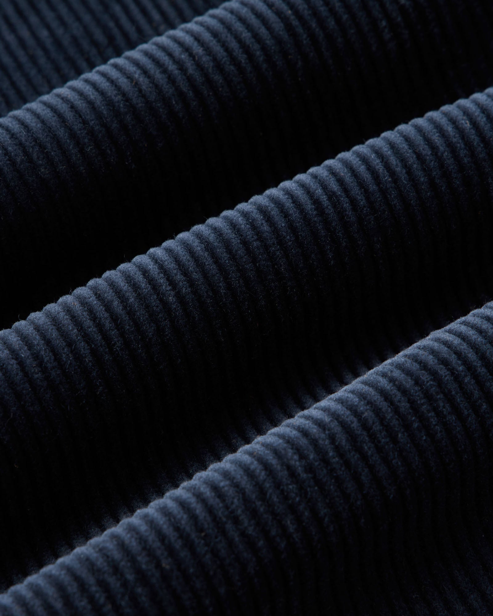 material shot of the fabric on The Riley Sportcoat in Dark Navy Corduroy, Outerwear by Taylor Stitch