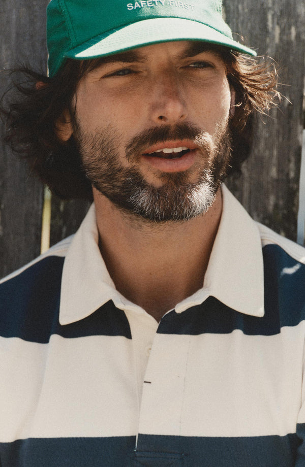 fifit model showing off the collar on The Rugby Shirt in Navy Stripe