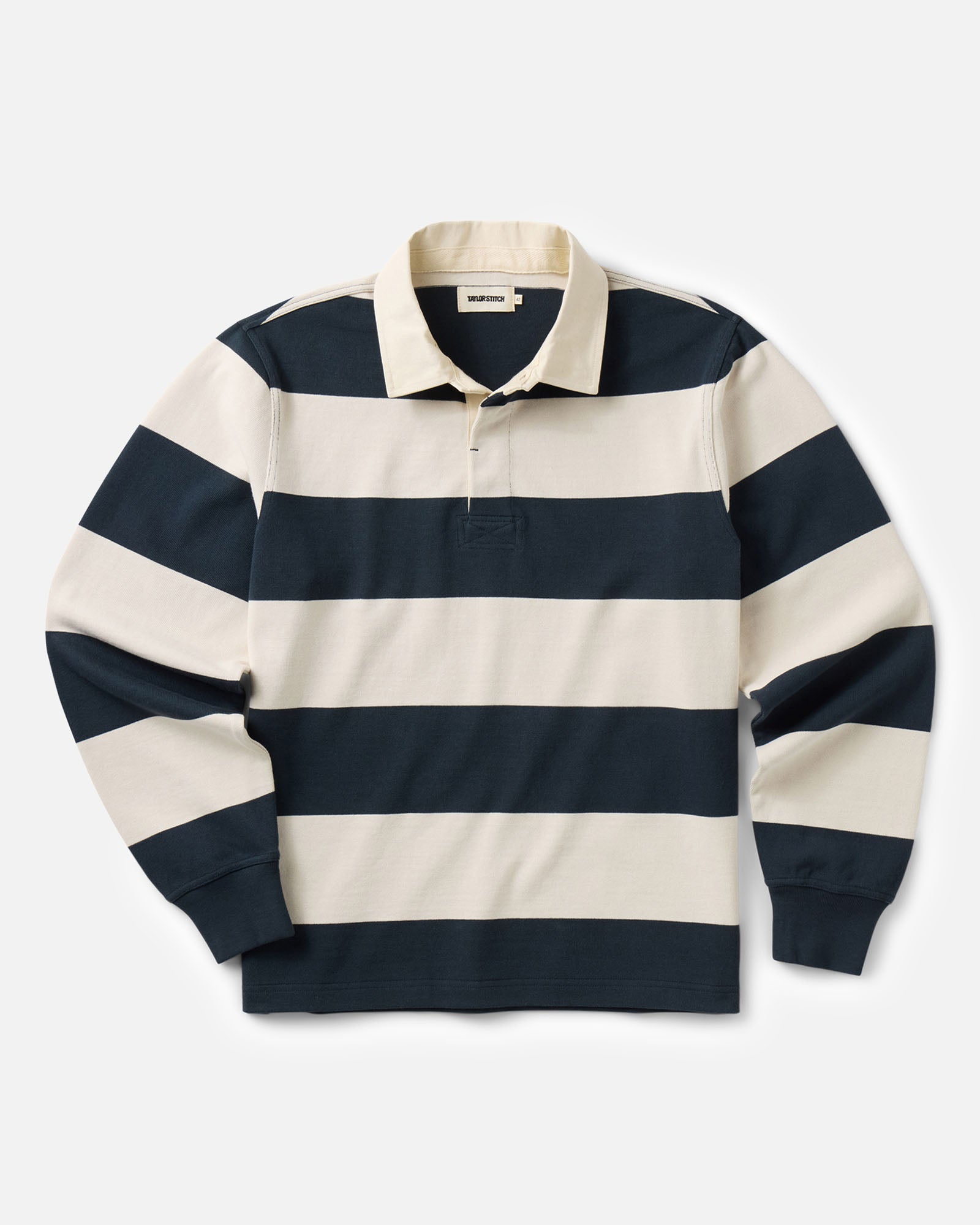 flatlay of The Rugby Shirt in Navy Stripe, Knits by Taylor Stitch