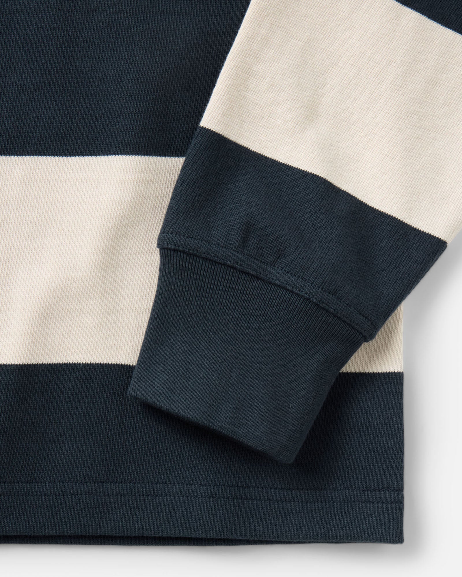 material shot of the sleeve on The Rugby Shirt in Navy Stripe, Knits by Taylor Stitch
