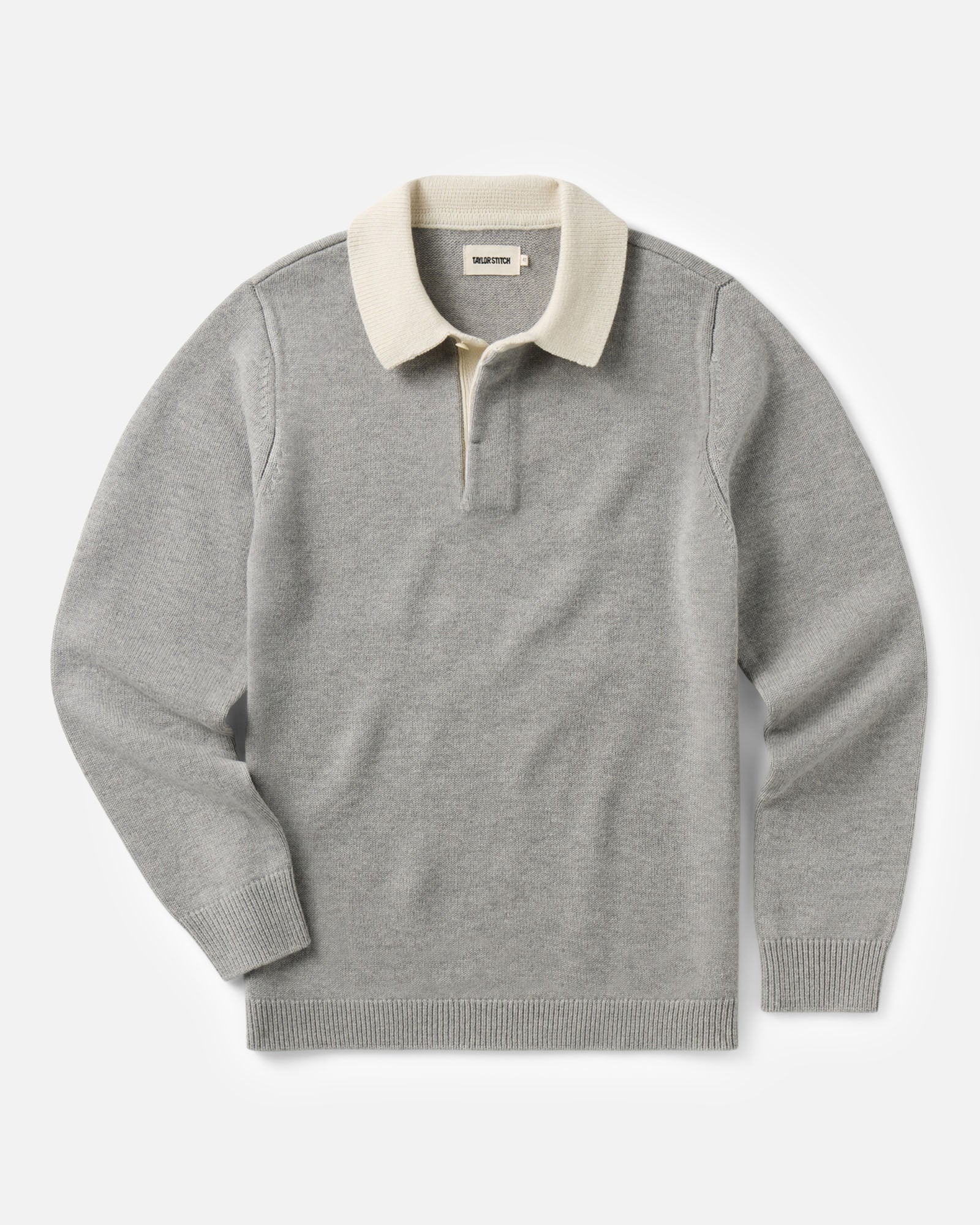 flatlay of The Rugby Sweater in Heather Grey Merino, Sweaters by Taylor Stitch