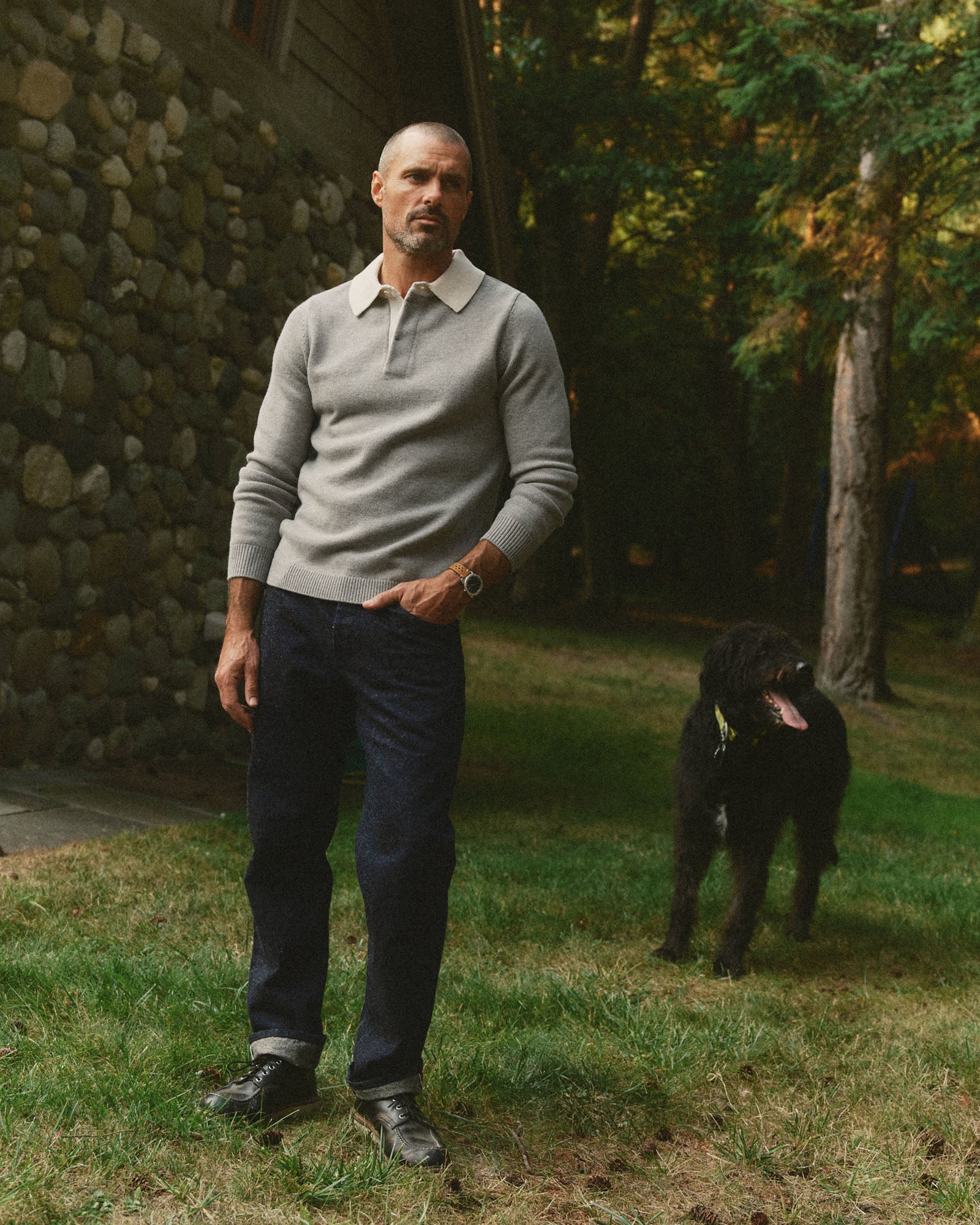 fit model posing in The Rugby Sweater in Heather Grey Merino, Sweaters by Taylor Stitch