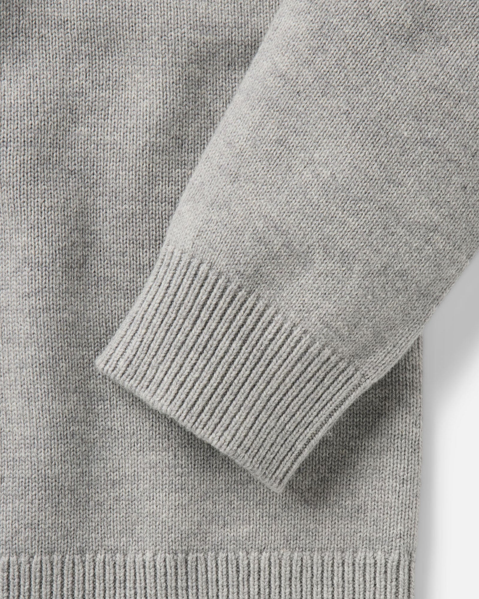 material shot of the sleeve on The Rugby Sweater in Heather Grey Merino, Sweaters by Taylor Stitch
