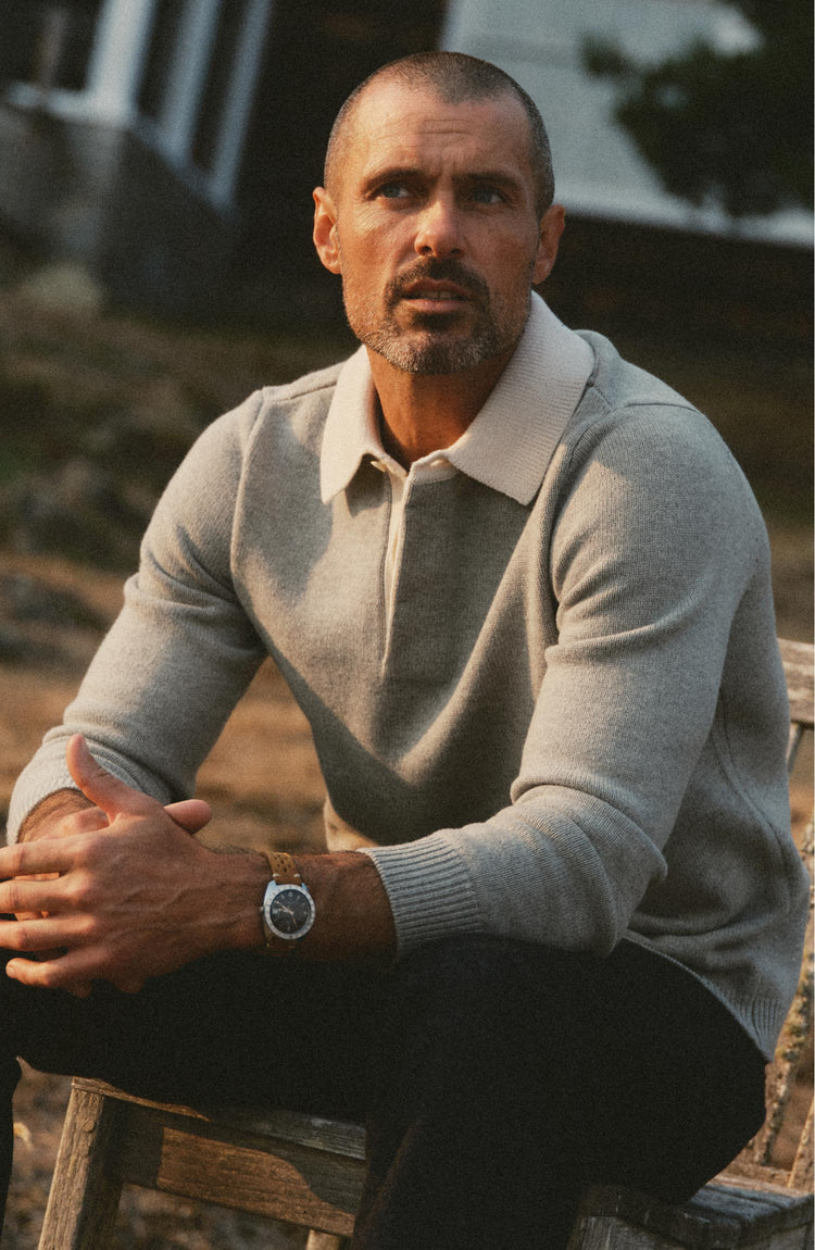 fit model posing in The Rugby Sweater in Heather Grey Merino