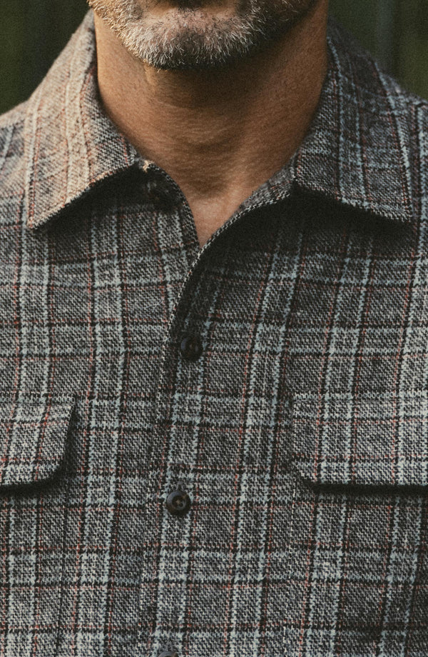fit model showing off the buttons on The Shore Shirt in Flint Check Wool