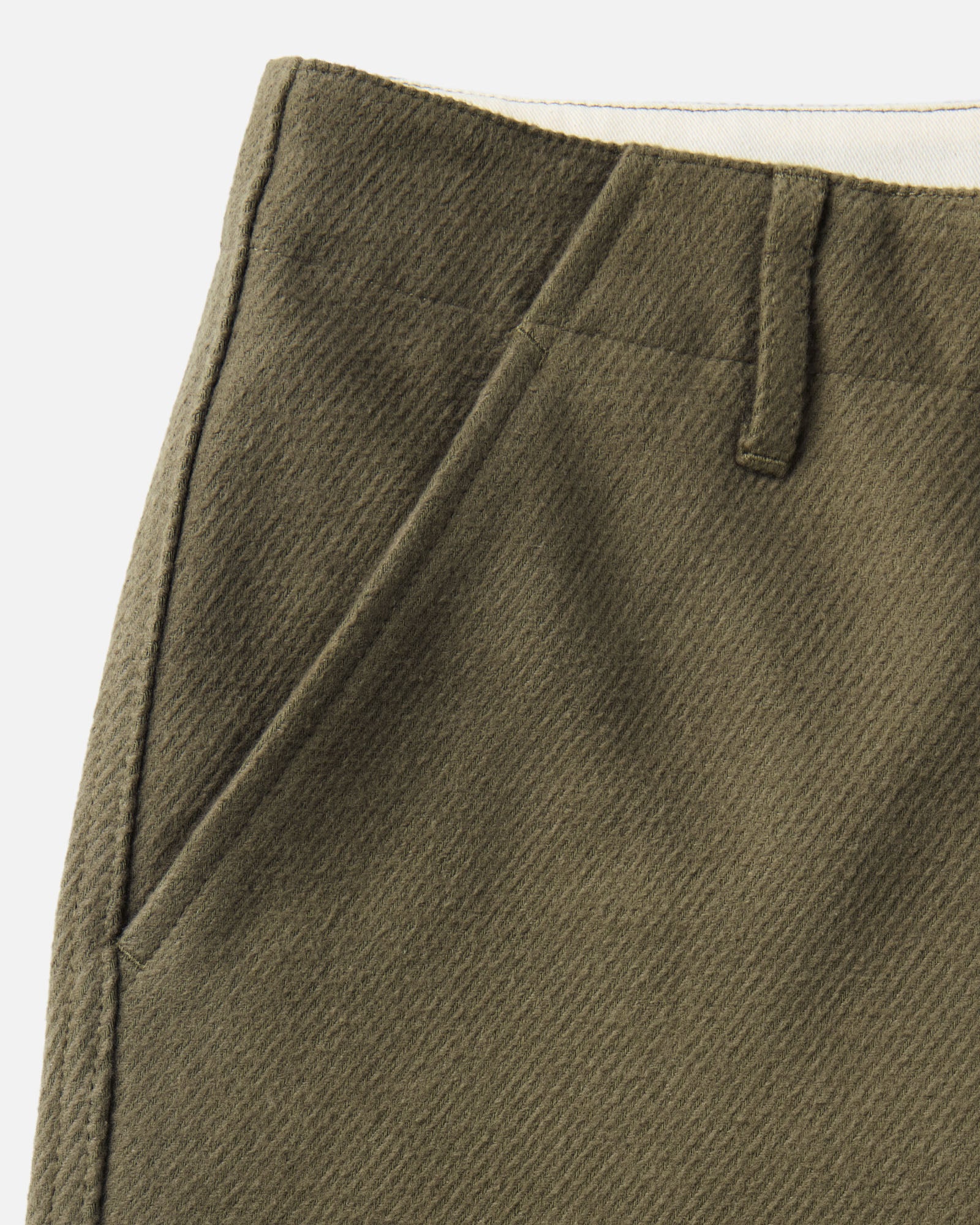 material shot of the sleeve on The Carnegie Pant in Fatigue Olive Washed Moleskin, Bottoms by Taylor Stitch