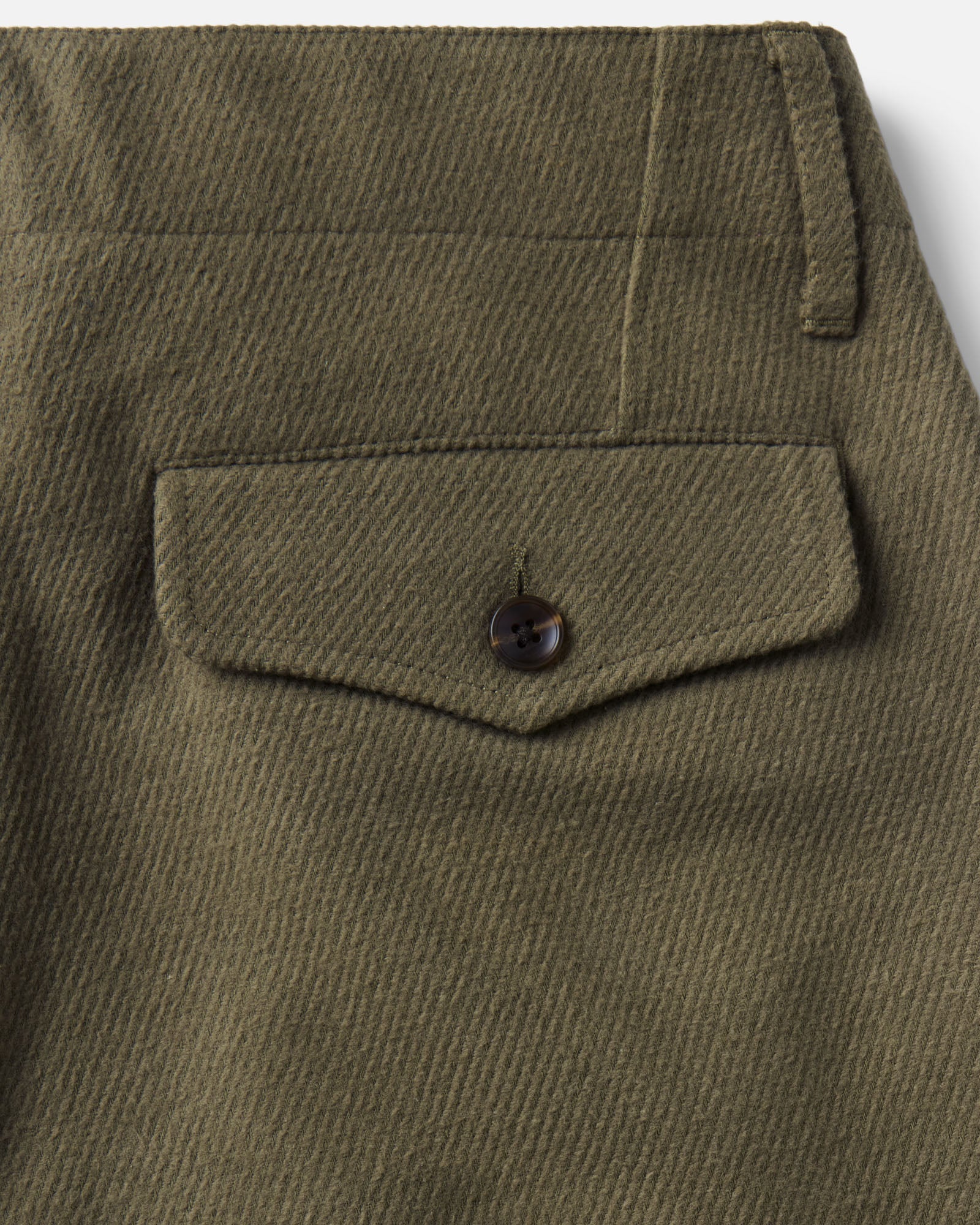 material shot of the back pocket on The Carnegie Pant in Fatigue Olive Washed Moleskin, Bottoms by Taylor Stitch