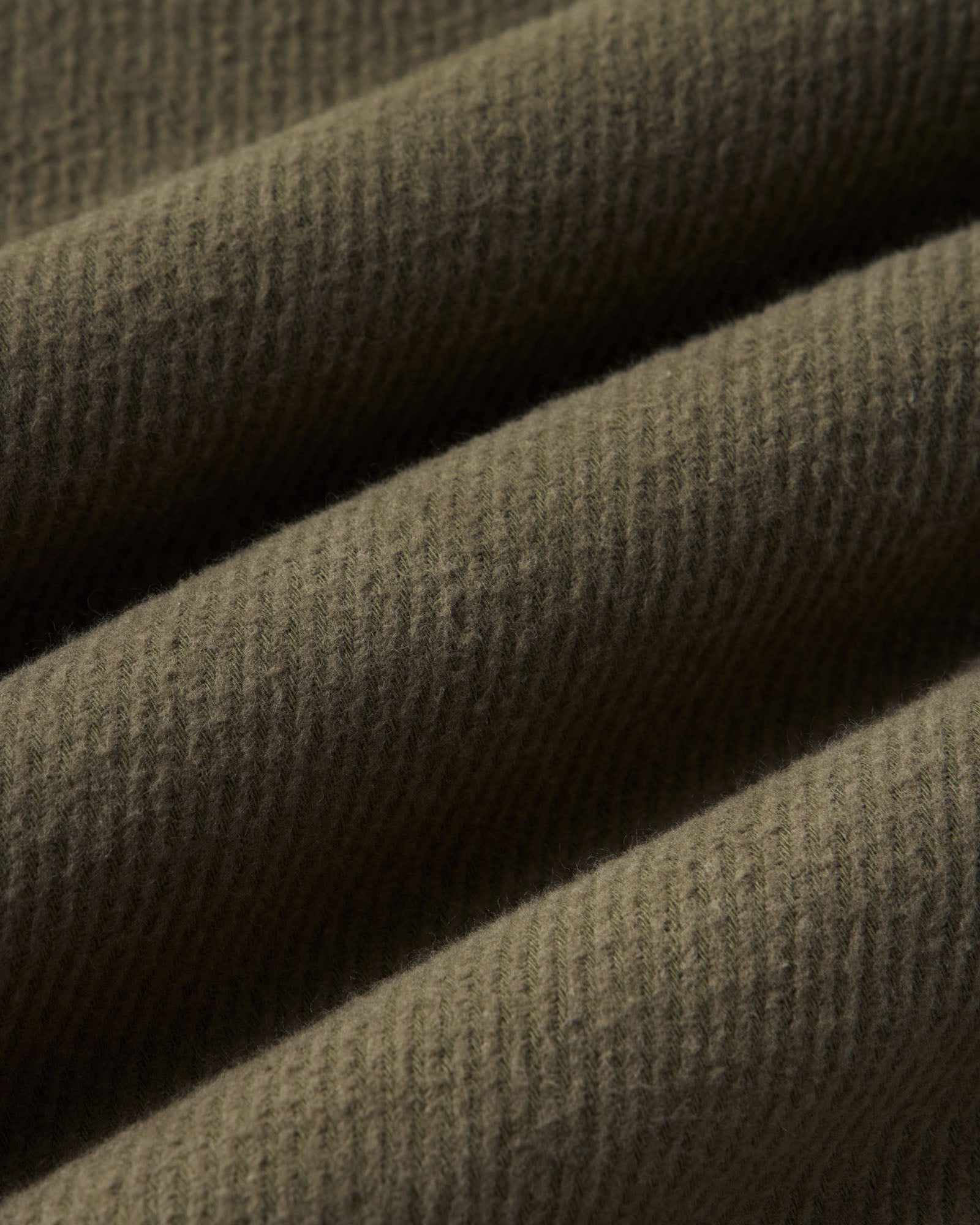 material shot of the fabric on The Carnegie Pant in Fatigue Olive Washed Moleskin, Bottoms by Taylor Stitch
