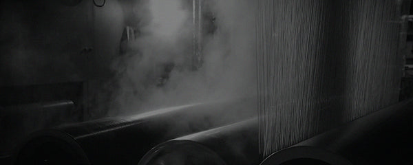 Close up of threads on a Shuttle Loom