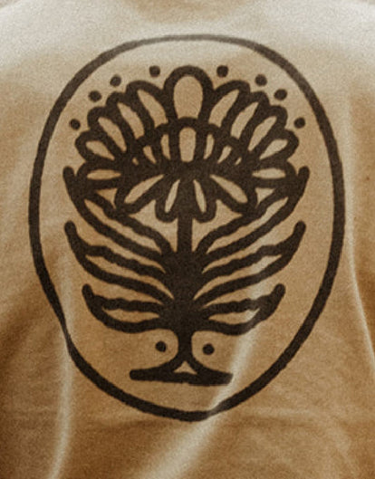 The flower print on the back of The Heavy Bag Tee in Khaki Dahlia