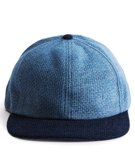 flatlay of the front of a TS x Hypeadelic cap, Accessories by Taylor Stitch