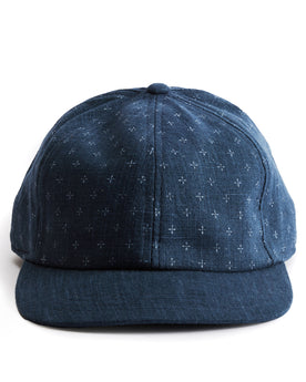 flatlay of the front of a TS x Hypeadelic cap, Accessories by Taylor Stitch