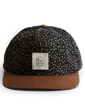 flatlay of the front of a TS x Hypeadelic cap, Accessories by Taylor Stitch