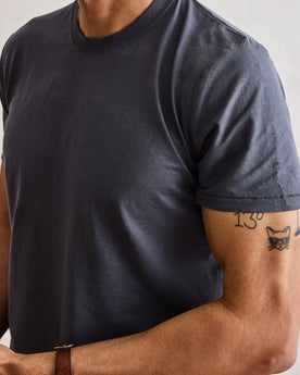 fit model showing the sleeves on The Cotton Hemp Tee in Navy, Knits by Taylor Stitch