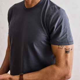fit model showing the sleeves on The Cotton Hemp Tee in Navy