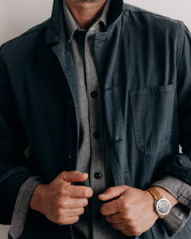 fit model buttoning the front of The Ojai Jacket in Organic Navy Foundation Twill, Outerwear by Taylor Stitch