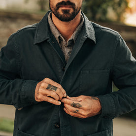 fit model buttoning the front of The Ojai Jacket in Organic Navy Foundation Twill