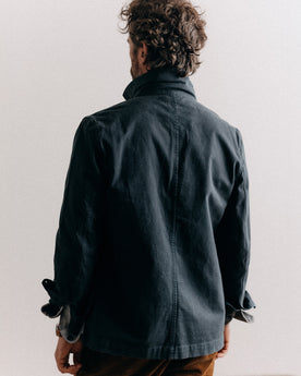 fit model sitting in The Ojai Jacket in Organic Navy Foundation Twill, Outerwear by Taylor Stitch