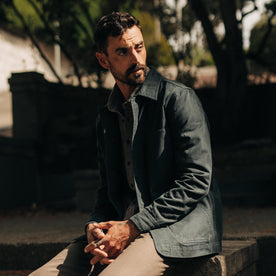 fit model sitting in The Ojai Jacket in Organic Navy Foundation Twill