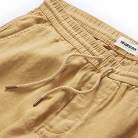 material shot of the drawcords on The Apres Short in Wheat Hemp