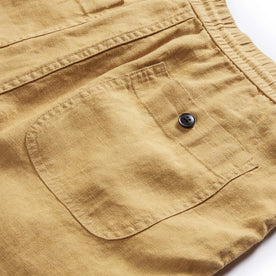 material shot of the rear pocket on The Apres Short in Wheat Hemp