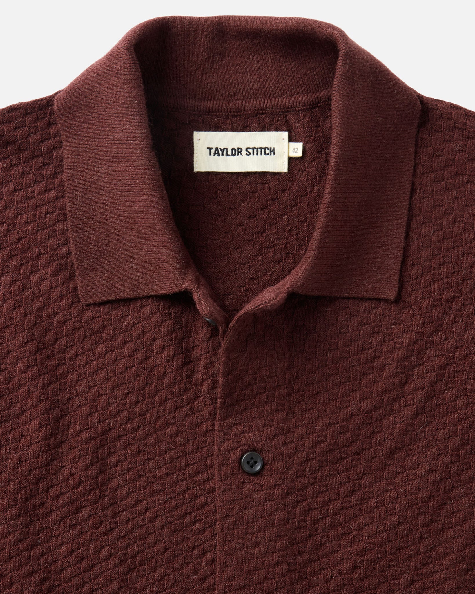 material shot of the collar on The Arlo Sweater Polo in Burgundy Texture Knit, Knits by Taylor Stitch