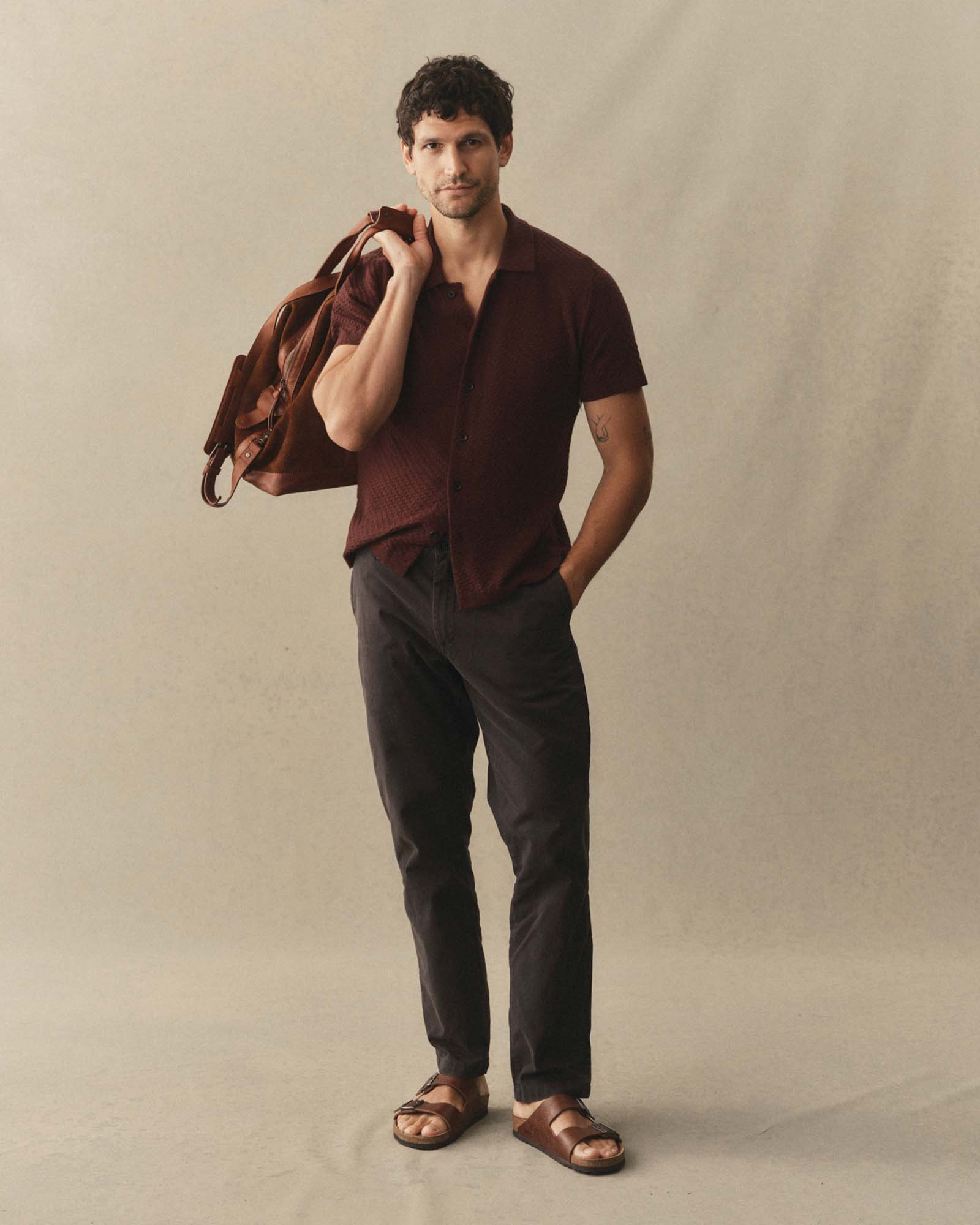 fit model showing off The Arlo Sweater Polo in Burgundy Texture Knit, Knits by Taylor Stitch
