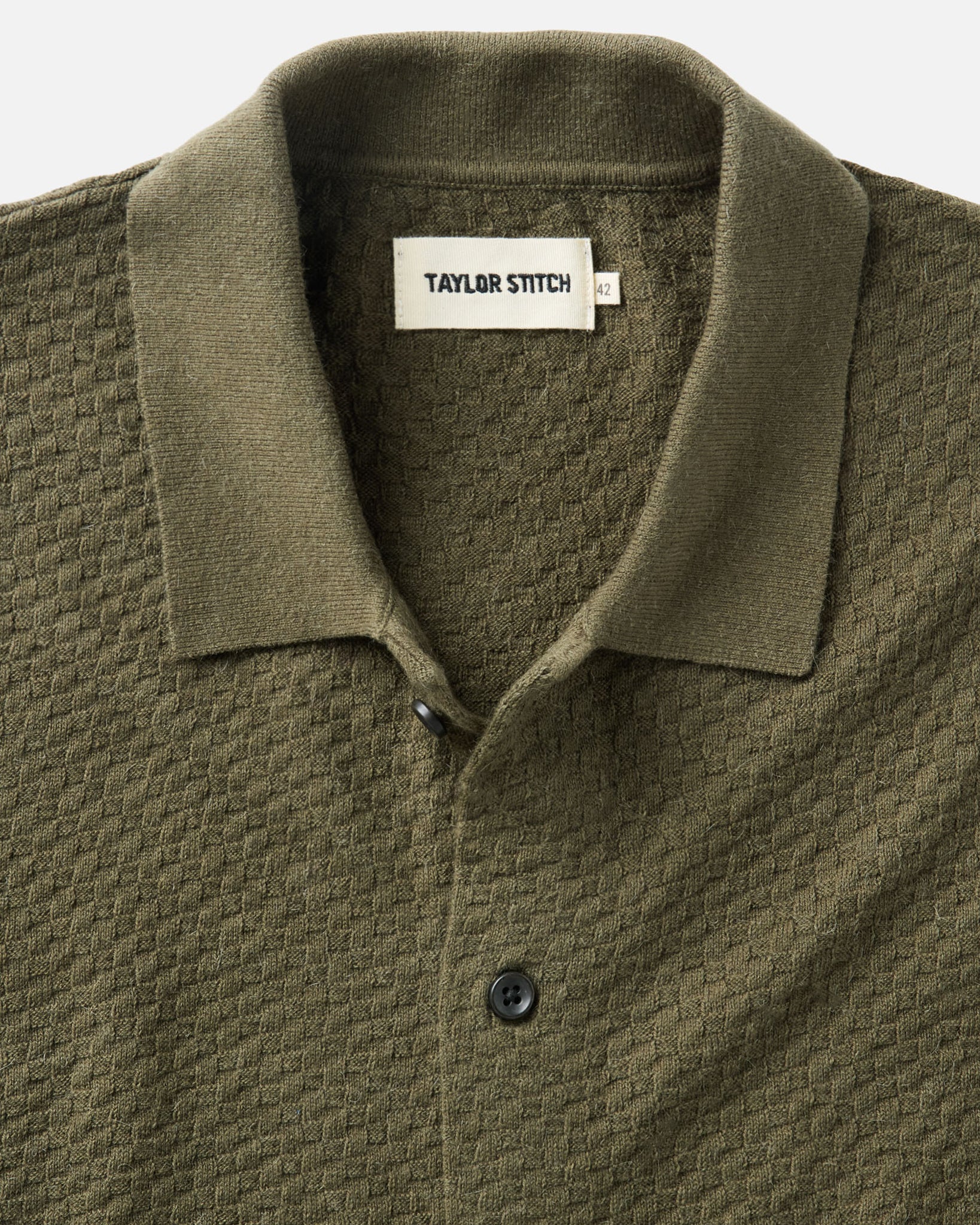 material shot of the collar on The Arlo Sweater Polo in Cilantro Texture Knit, Knits by Taylor Stitch