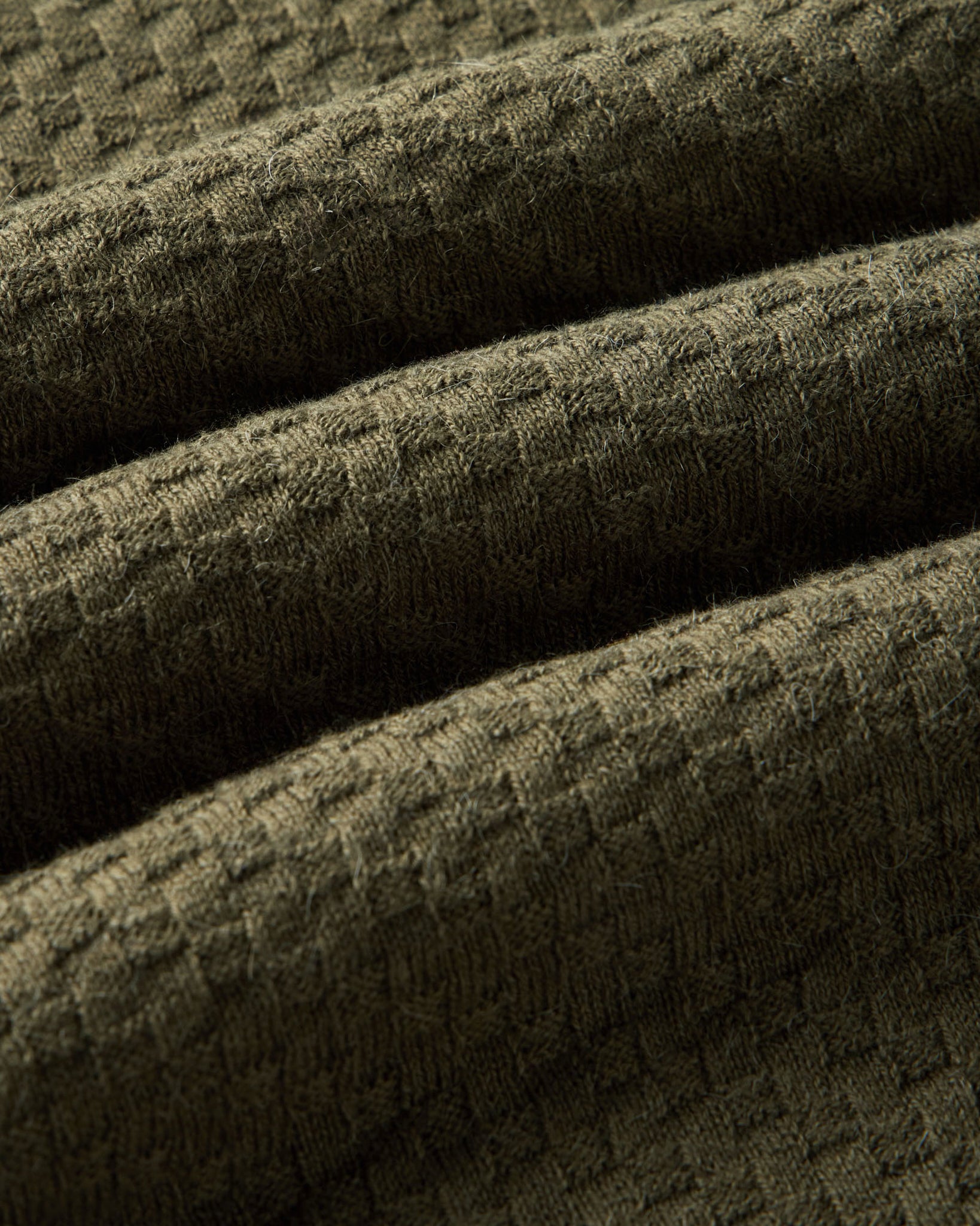 material shot of the fabric on The Arlo Sweater Polo in Cilantro Texture Knit, Knits by Taylor Stitch
