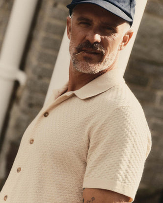 fit model showing off The Arlo Sweater Polo in Oat Texture Knit