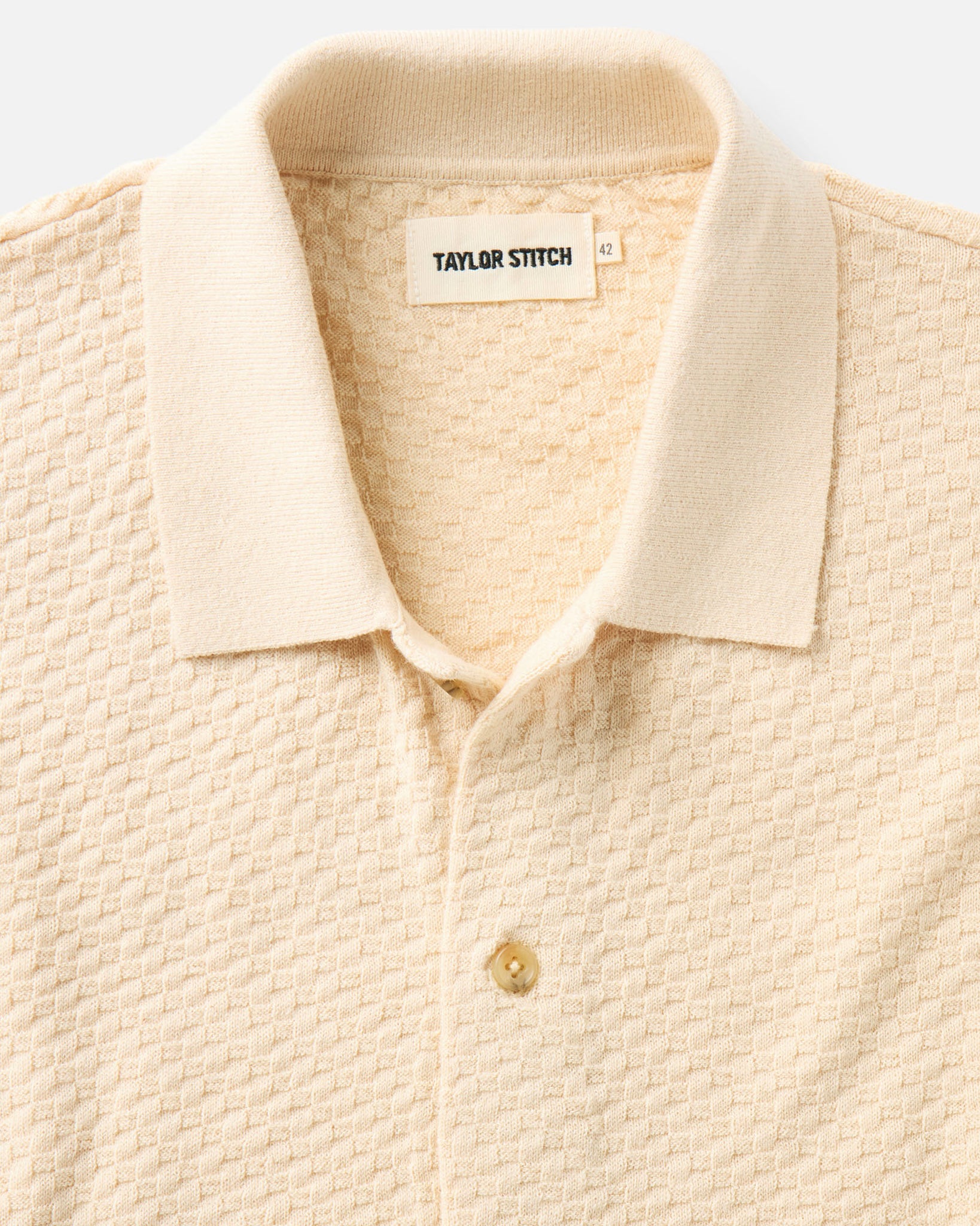 material shot of the collar on The Arlo Sweater Polo in Oat Texture Knit, Knits by Taylor Stitch