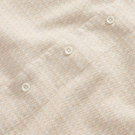 material shot of the natural buttons on The Conrad in Sand Jacquard