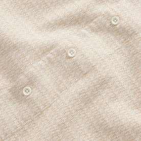 material shot of the natural buttons on The Conrad in Sand Jacquard