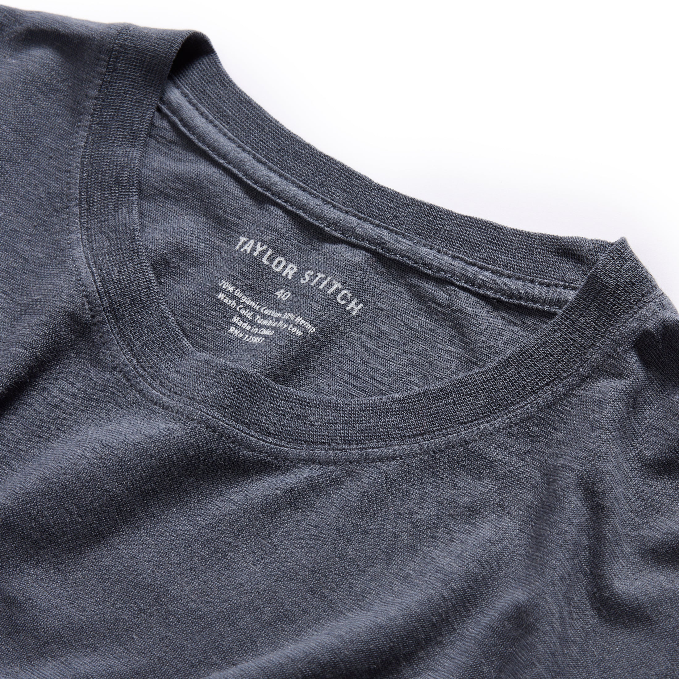 material shot of the neck opening on The Cotton Hemp Tee in Navy, Knits by Taylor Stitch