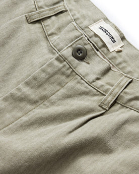 material shot of the button on The Matlow Short in Arid Eucalyptus Washed Herringbone, Bottoms by Taylor Stitch