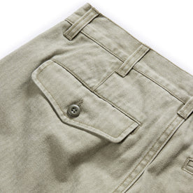 material shot of the back flap pocket on The Matlow Short in Arid Eucalyptus Washed Herringbone