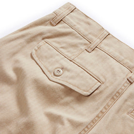 material shot of the back flap pocket on The Matlow Short in Dune Washed Herringbone