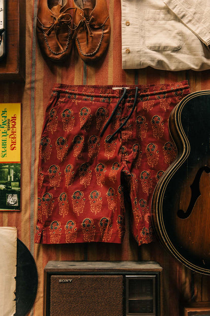 A flatlay of an outfit, including our The Adventure Short in Rust Floral.