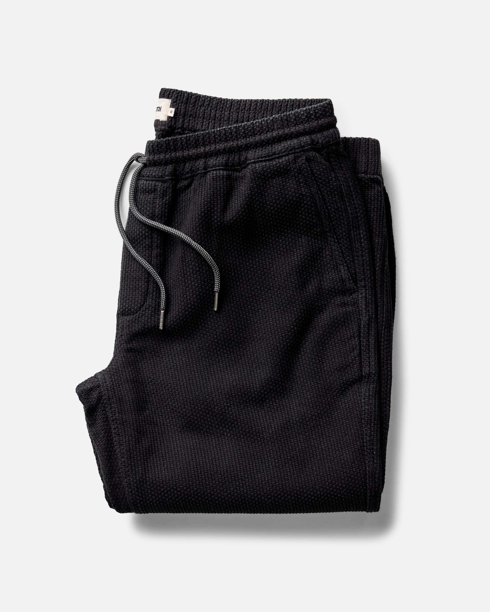 folded flatlay of The Apres Pant in Black Indigo Sashiko, Bottoms by Taylor Stitch