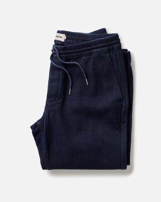 folded flatlay of The Apres Pant in Rinsed Indigo Sashiko