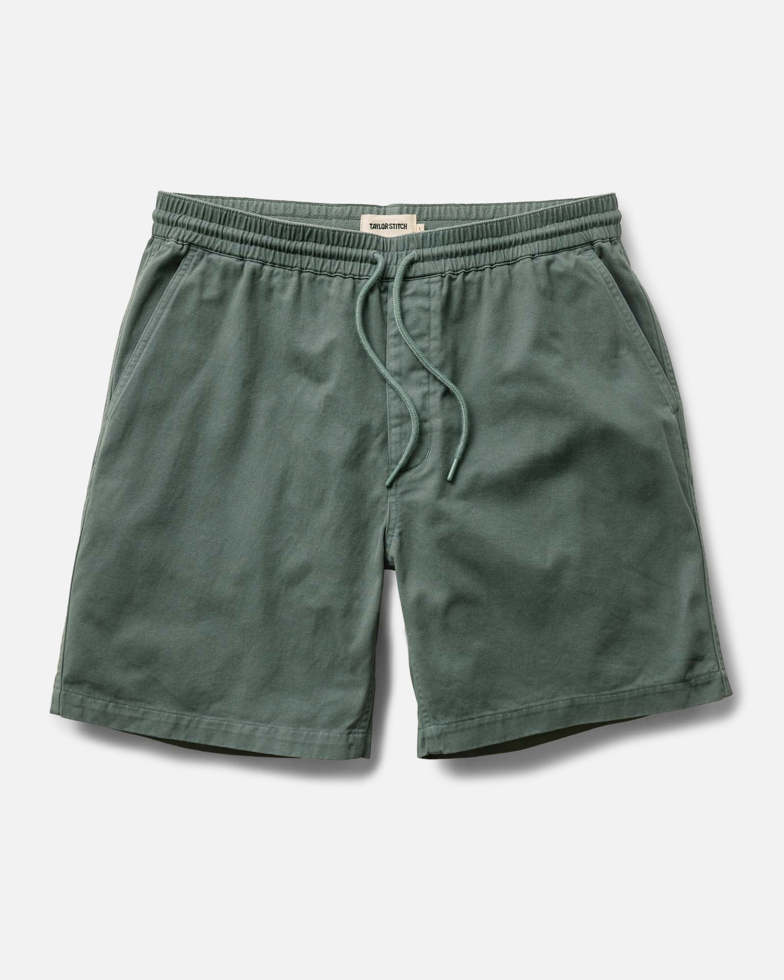 flatlay of The Apres Short in Organic Deep Sea Foundation Twill, Bottoms by Taylor Stitch