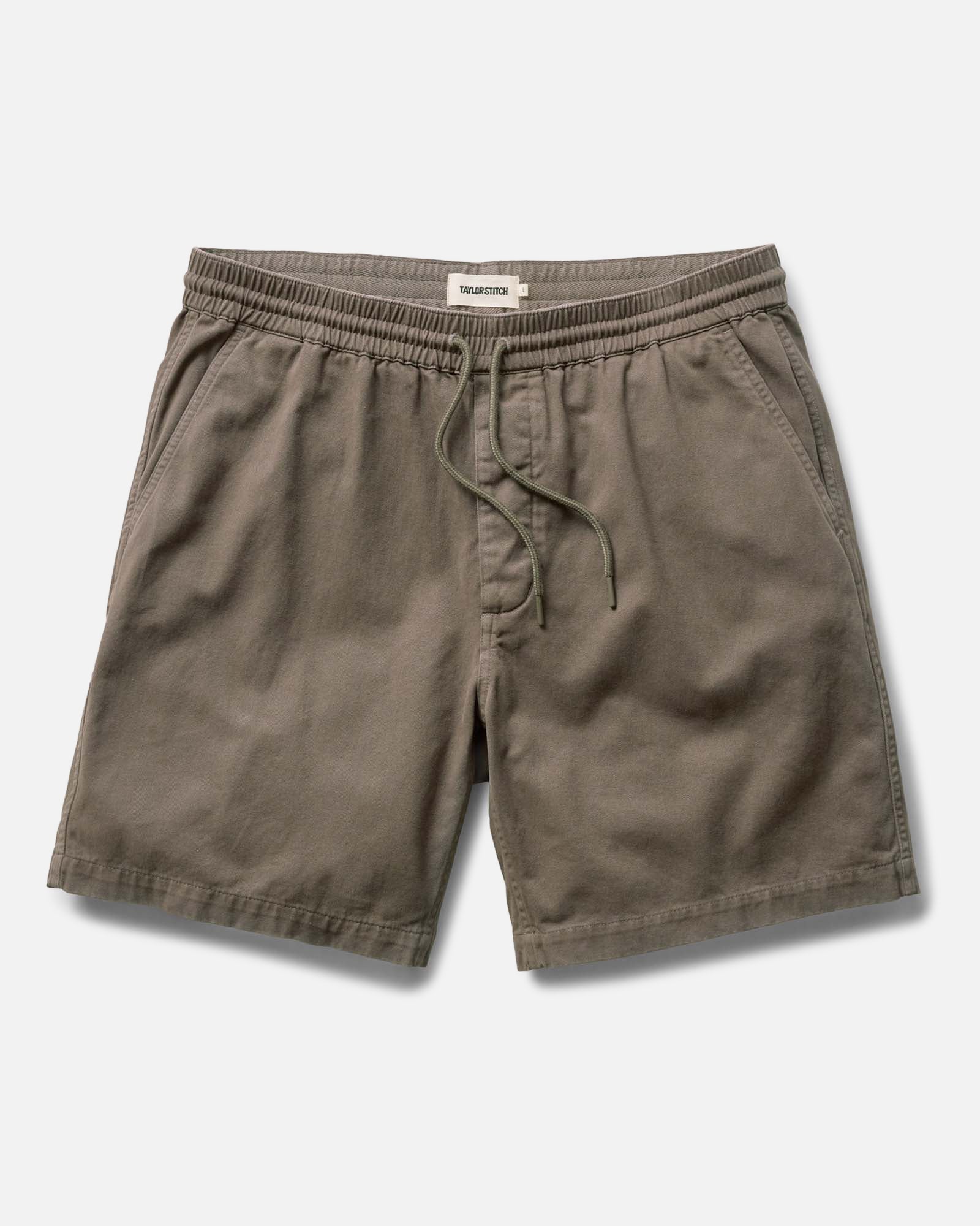 flatlay of The Apres Short in Organic Espresso Foundation Twill, Bottoms by Taylor Stitch