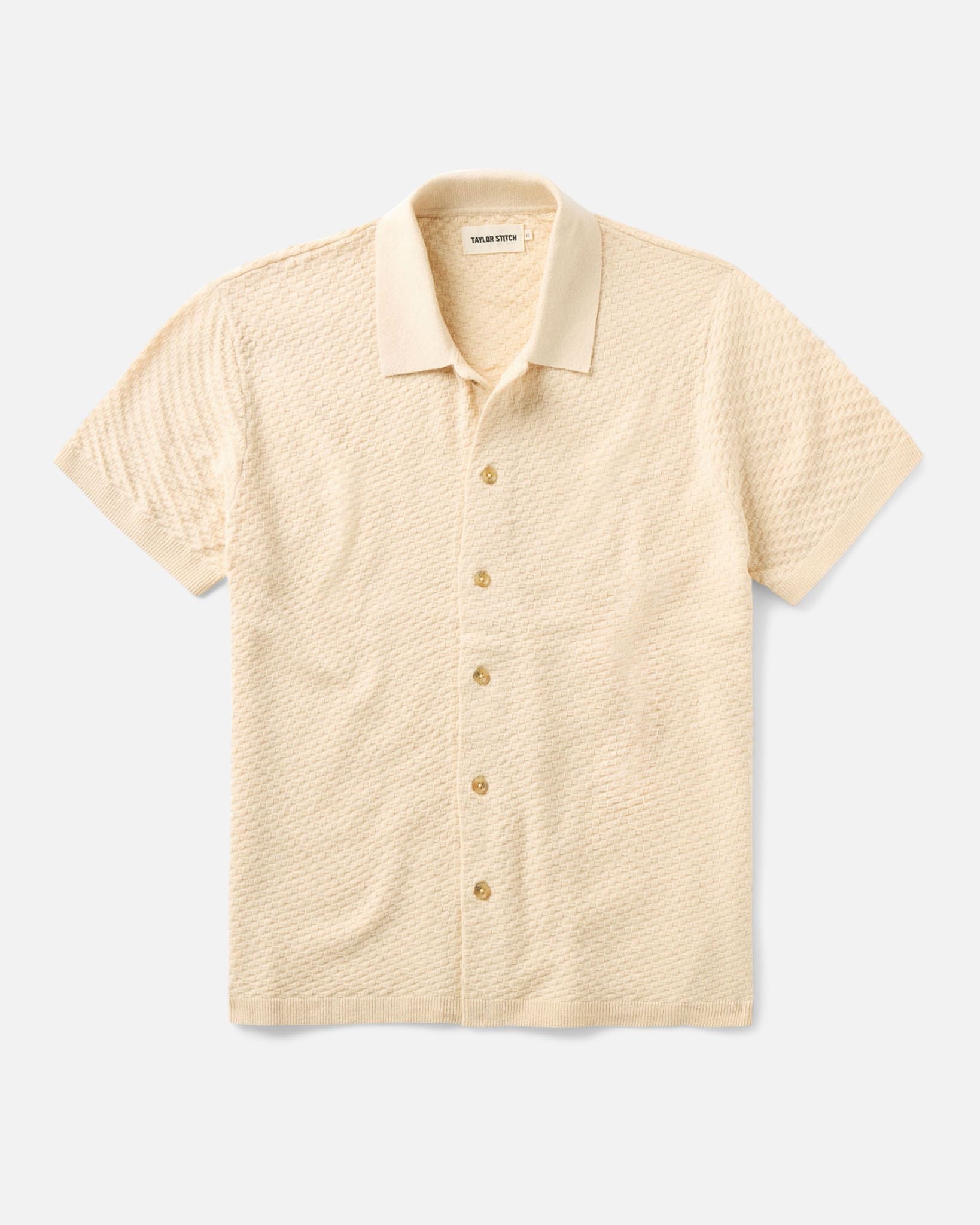 flatlay of The Arlo Sweater Polo in Oat Texture Knit, Knits by Taylor Stitch
