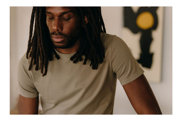 fit model showing off The Organic Cotton Tee in Sage