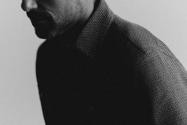 fit model showing off sashiko detailing on Utility Shirt