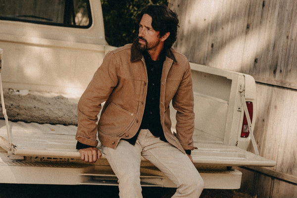 fit model posing in The Ryder Jacket in Tobacco Chipped Canvas