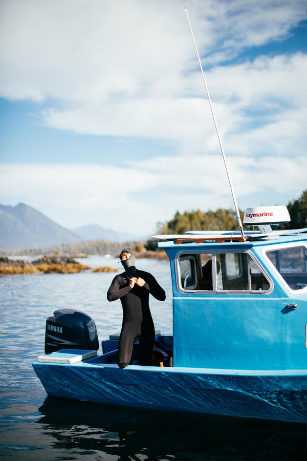 A simple wooden chair, in a room.