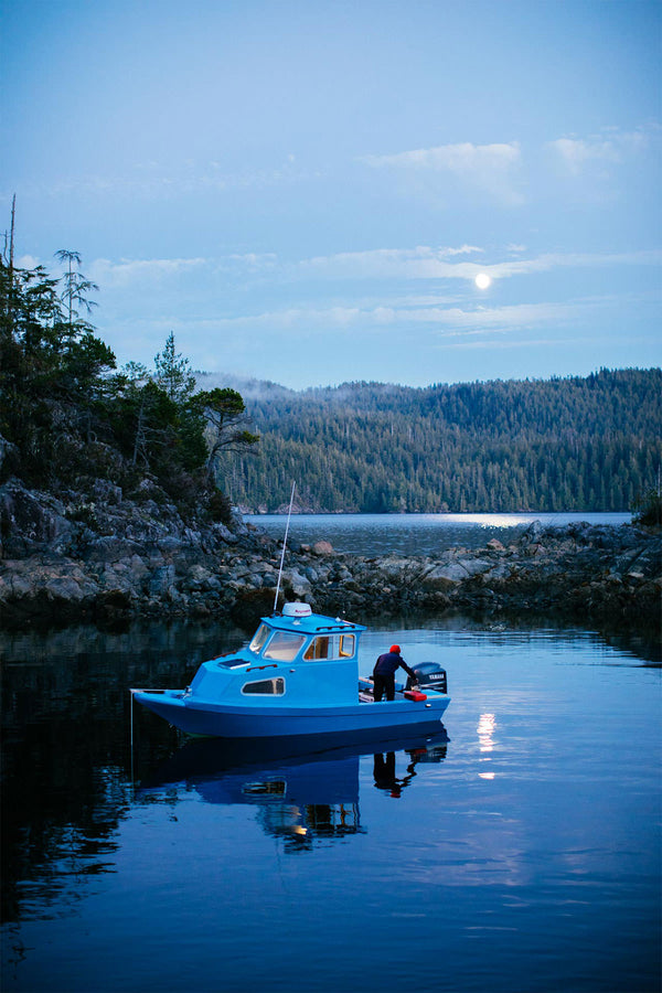 Lone crewmember remains on board, checks the windlass.